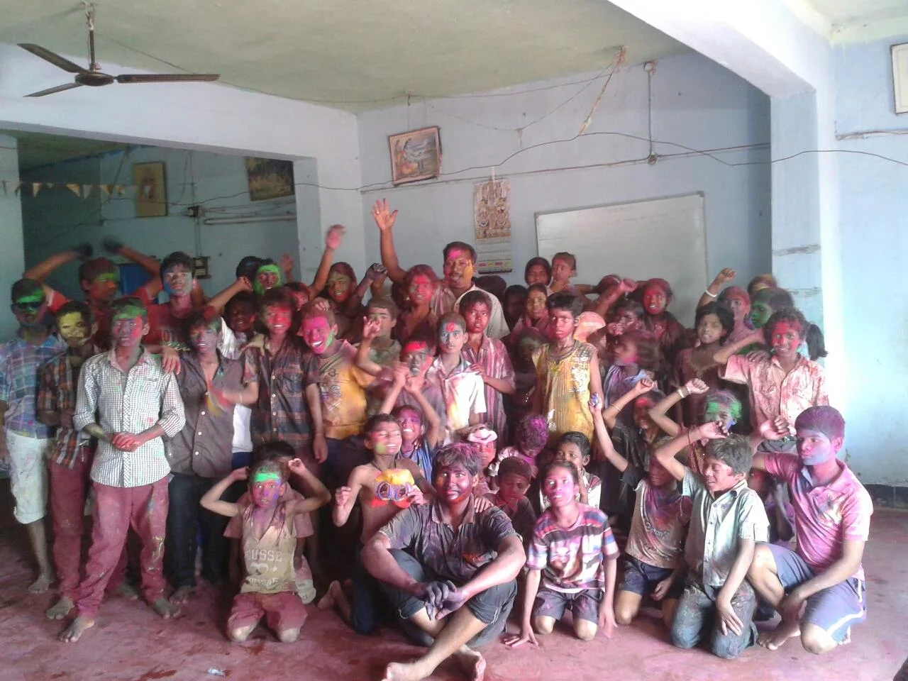 The Ashram community celebrating Holi